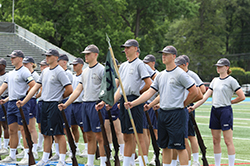 People standing in the field. Links to Gifts That Pay You Income