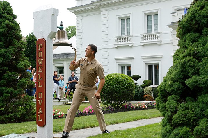 A man ringing a bell A man ringing a bell